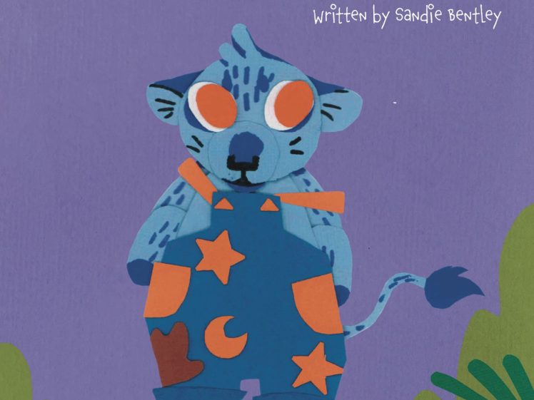 Image of Illustrated book cover showing a blue, cartoon animal named Franklyn wearing starry dungarees and orange boots, standing against a purple background with green leaves. Title: Franklyn’s Terrible Wonderful Day.