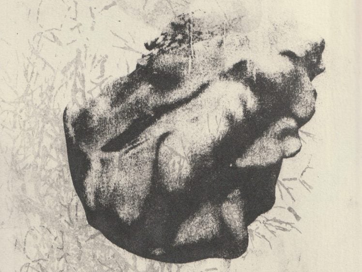 Image of A textured, abstract black and white image featuring a large, crumpled dark shape at the centre, with faint, irregular lines and smudges in the background creating a sense of depth and movement.